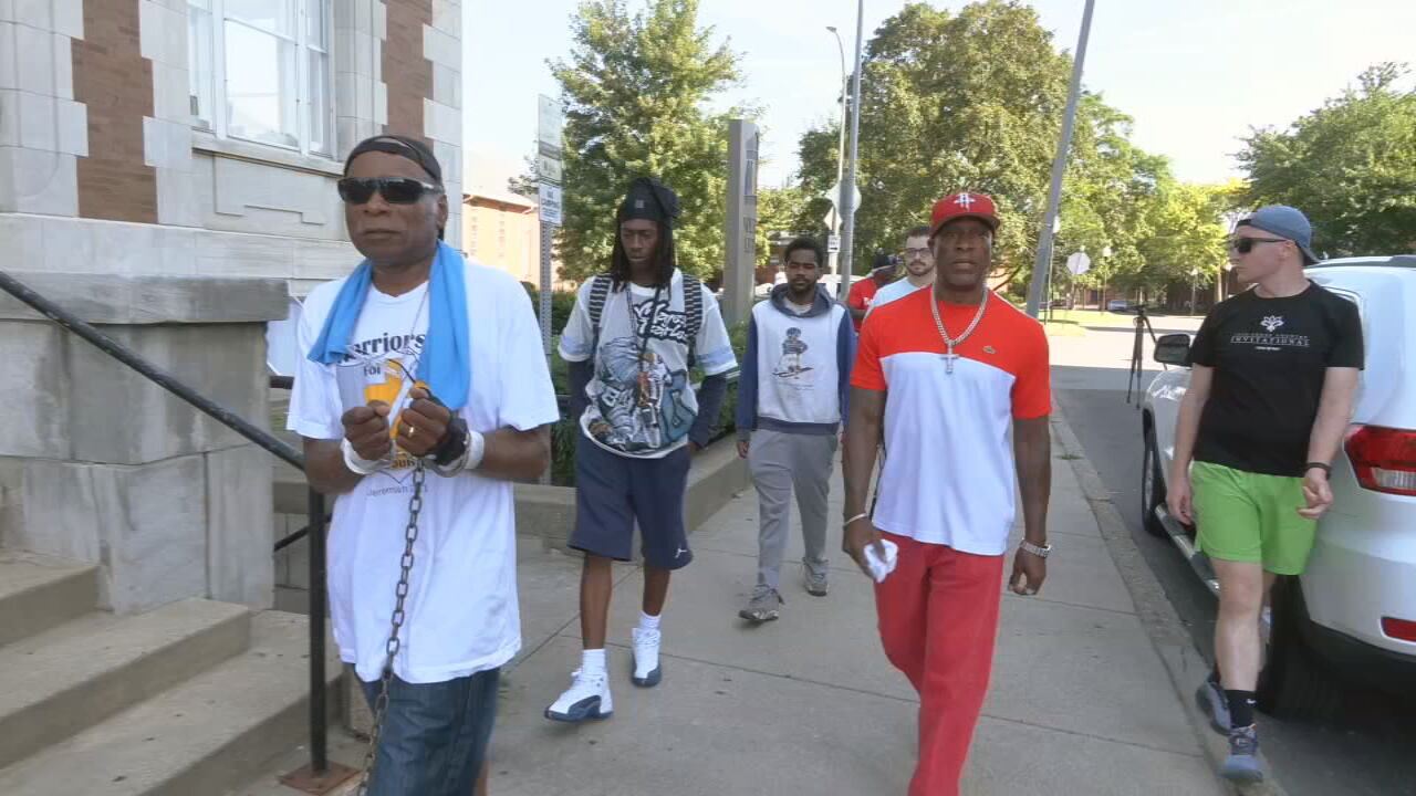 Louisville activist leads walk to raise awareness of violence after 2 mothers murdered